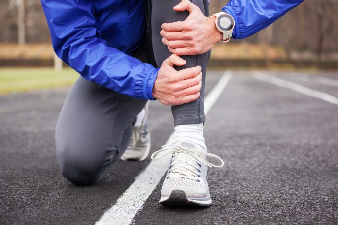 runner suffering from shin splints