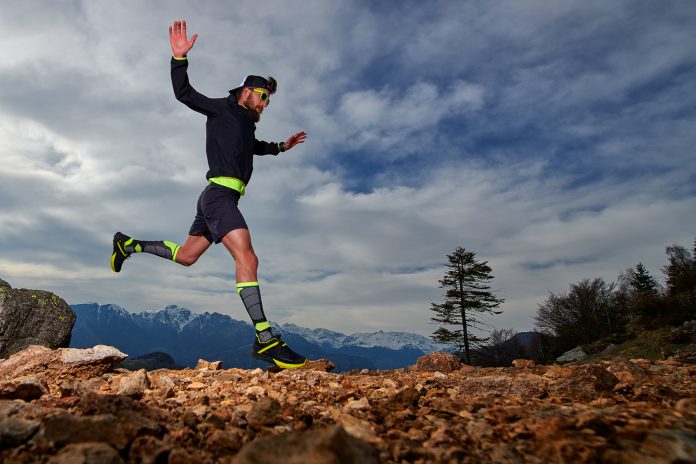 man running on trail