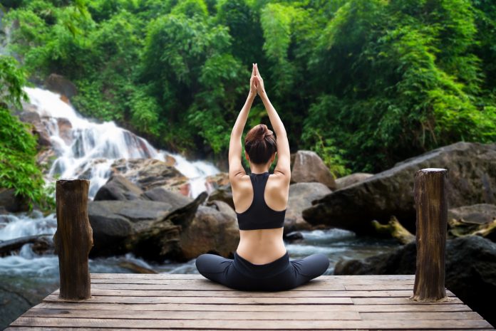runner doing yoga