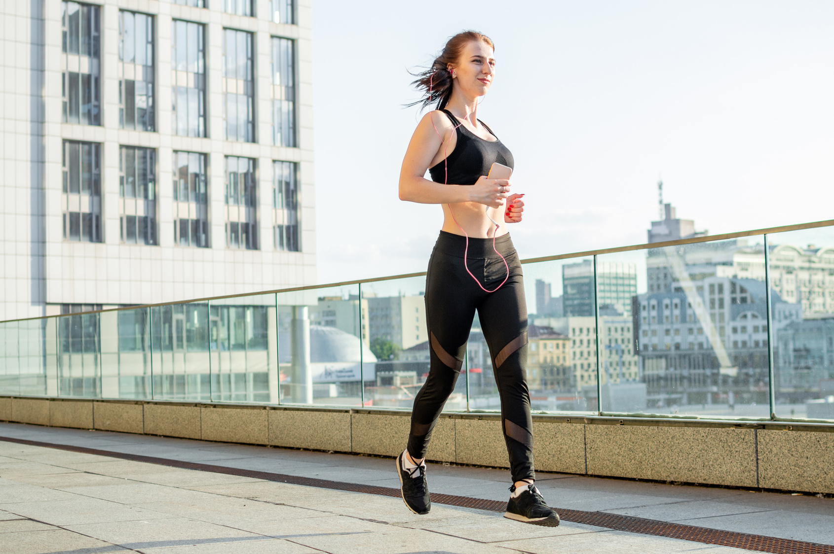 Take a mile. Рене и бег. Run a Mile. Woman stretching in Street after Running.